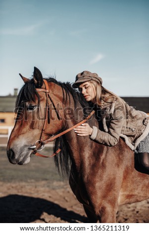 Similar – Image, Stock Photo Portrait of adult woman with beautiful horse in nature. Sunlight, silhouette.Concept of love for lesser brothers, caring and animal training