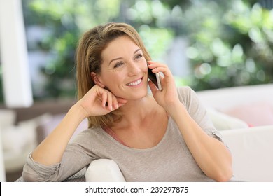 Beautiful Blond Woman Talking On Mobile Phone