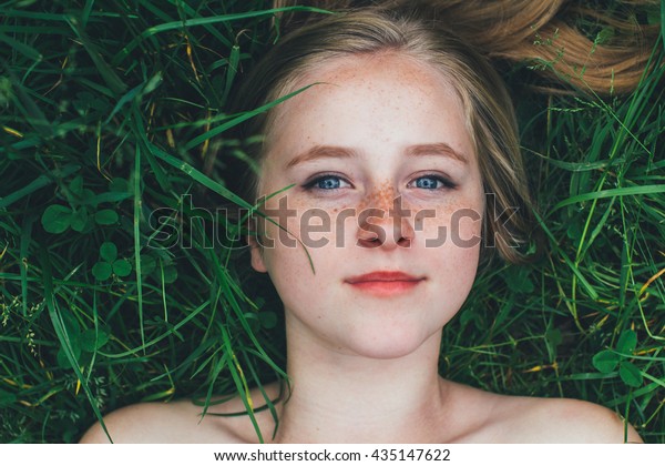 Beautiful Blonde Blueeyed Girl Freckles Lying Stock Photo Edit