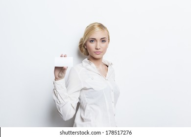 Beautiful Blonde Girl Holding Blank Business Card 