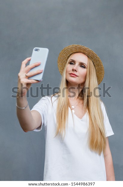 Beautiful Blonde Girl Makes Selfie On Stock Photo Edit Now