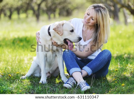 Similar – Happy smiling dog with its pretty young owner