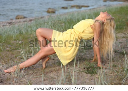 Similar – Young woman on the beach in the sun