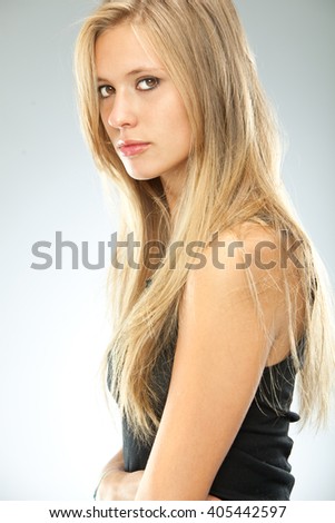 Beautiful Blonde Serious Girl Black Dressed Isolated On Grey Beautiful Blonde Serious Girl Black Dressed Isolated On Grey
