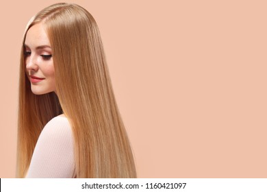 Beautiful Blonde Woman Beauty Model Girl With Perfect Makeup And Long Straight Hair On Light Copyspace