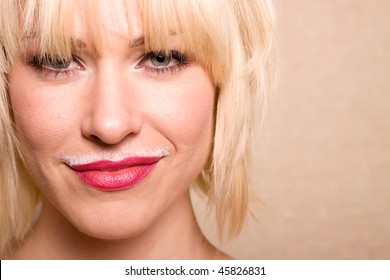 Beautiful Blonde Woman With Milk Mustache