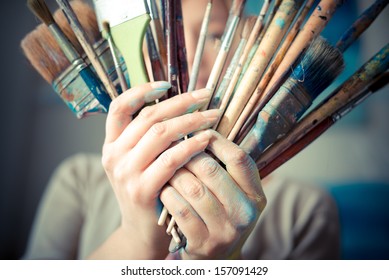 Beautiful Blonde Woman Painter In Her Studio