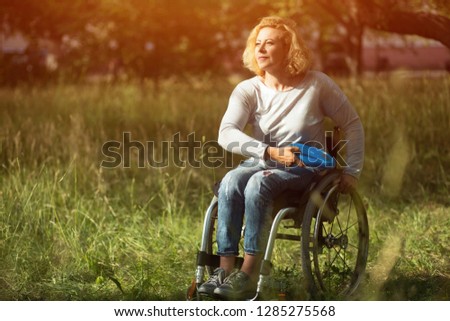 Similar – Senior woman in wheelchair