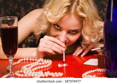 Beautiful Blonde Woman Sniffing Cocaine (Imitation) 