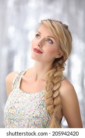 Beautiful Blonde Young Woman With Braid Hairdo 