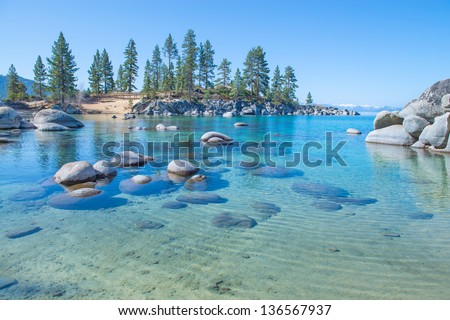 Beautiful blue clear water on the shore of the lake Tahoe