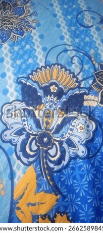 Beautiful blue floral batik pattern. Perfect for home decor and textile enthusiasts. Traditional Indonesian art. #Batik #Textile #IndonesianArt #HomeDecor #FloralPattern #Fabric #TraditionalArt.