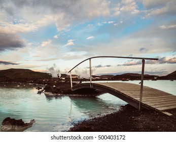 Beautiful blue lagoon with a wooden bridge - Iceland - Powered by Shutterstock