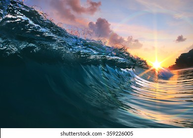 Beautiful Blue Ocean Surfing Wave Under Sunset