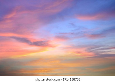 Beautiful Blue Orange Sky With Clouds Background.