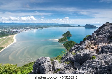 Beautiful blue sea and green island. Spiky rocks with city and beach at Prachuap Bay in the west side of the Gulf of Siam, aerial view from the Khao Lom Muak,(Prachuap Khiri Khan) Unseen Thailand