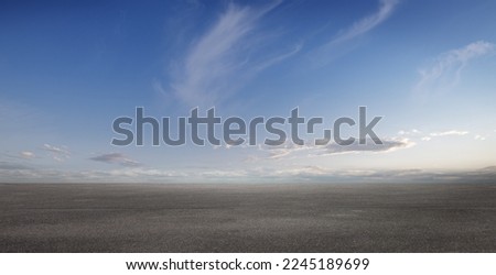 Beautiful Blue Sky Background with Nice Subtle Clouds and Empty Spacious Concrete Floor