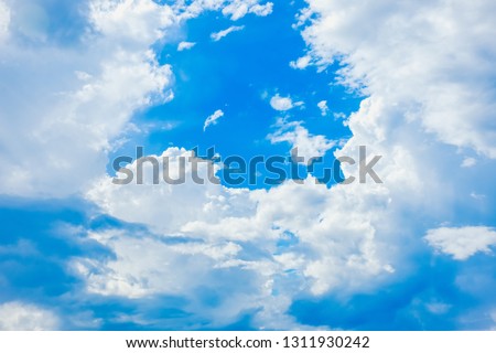Beautiful blue sky with clouds. Anime sky clouds, anime style. Dramatic white clouds and sunlight. Anime sunrise pastel background. Sky background for animation or designer.