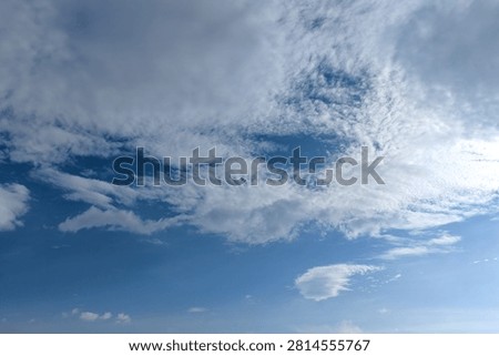 Beautiful Blue Sky with Dramatic White Clouds