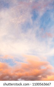 beautiful blue sky at sunset with pink clouds. vertical cropping - Shutterstock ID 1100563667