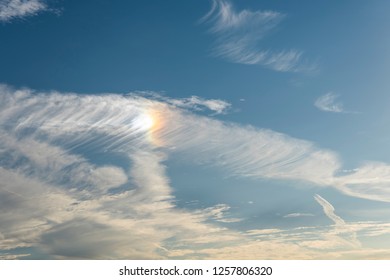 Beautiful blue sky with an unusual rainbow