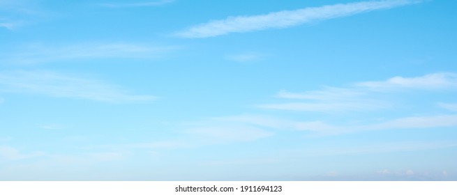 Beautiful Blue Sky And White Clouds Of Various Shapes With Sunlight. Nature Background