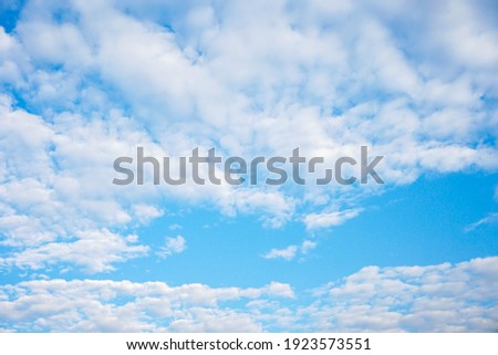 beautiful blue sky with white clouds	

