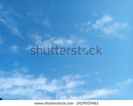 A beautiful blue Sky with white clouds.A wonderful Sean of nature 