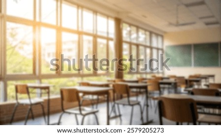 Beautiful blurred background of bright classroom and study room with panoramic windows and beautiful lighting. Blurred Empty school background.