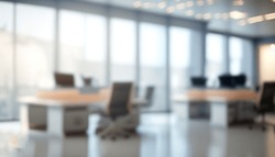 Beautiful Blurred Background Of A Light Modern Office Interior With Panoramic Windows And Beautiful Lighting.