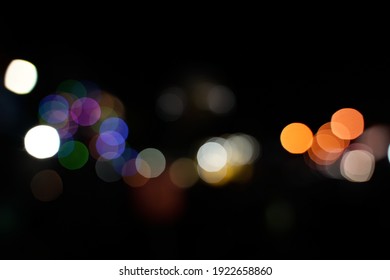 Beautiful blurry bokeh with balloon lights and motorcycle lights - Powered by Shutterstock