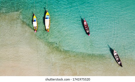 Beautiful boat on the beach, Top view from flying drone.