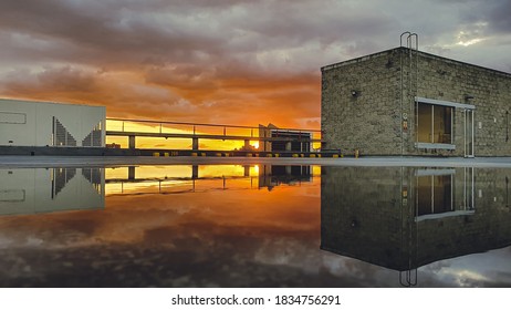 Beautiful Bogota Sunset With Reflection In Water