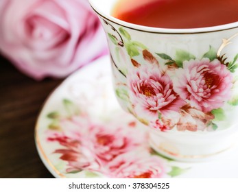 Beautiful Bone China Cup Of Tea With Violet Rose Selective Focus