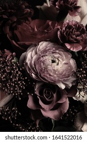 Beautiful bouquet of different flowers, closeup. Floral card design with dark vintage effect
