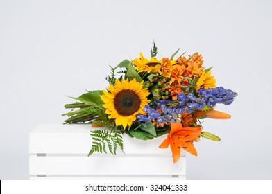 Beautiful Bouquet Of Fall Flowers On A White Crate