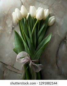 
Beautiful Bouquet Of White Tulips On A Marble Window Sill