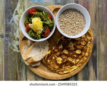 A beautiful bowl of food containing porridge, eggs, chopped chicken pieces, lettuce, carrots, tomatoes. Delicious and healthy food. Proper nutrition. - Powered by Shutterstock