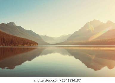 Beautiful Bowman lake with reflection of the spectacular mountains in Glacier National Park, Montana, USA. - Powered by Shutterstock