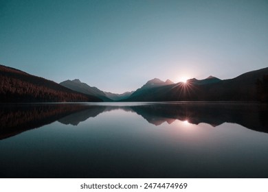 Beautiful Bowman lake with reflection of the spectacular mountains in Glacier National Park, Montana, USA. - Powered by Shutterstock