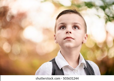  Beautiful Boy With Big Eyes Looking Up
