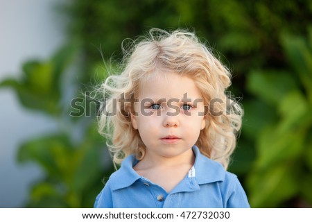 Similar – Small child with long blond hair