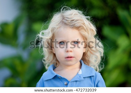 Similar – Small child with long blond hair