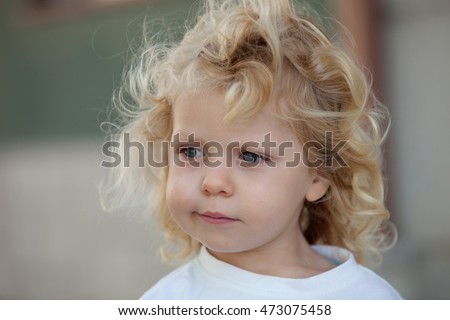 Similar – Small child with long blond hair