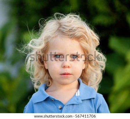 Similar – Small child with long blond hair