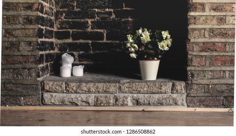 Beautiful Brick Fireplace With Candles And A Potted Gardenia