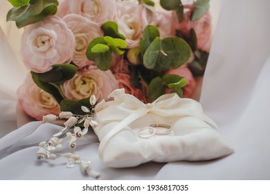 A Beautiful bridal bouquet with a jewelry box and wedding rings. Wedding Concept