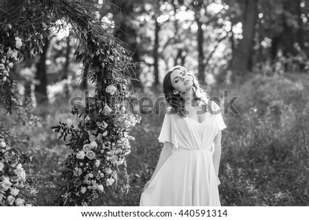 Similar – Woman posing in field of white flowers