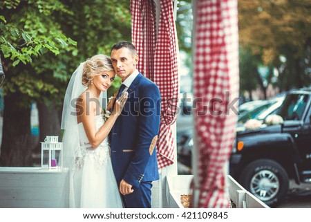 Beautiful bride in the cafe outdoors