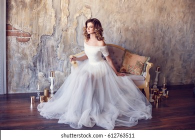 Beautiful Bride In A Gorgeous Dress In The Loft Room. Modern Wedding Photography